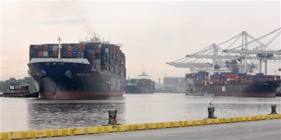 The CMA CGM Figaro is shown on the Savannah River in Savannah, Ga. The Figaro had to sail in loaded at half capacity to avoid scraping the river bottom, and even then could only navigate the relatively shallow channel at high tide. 